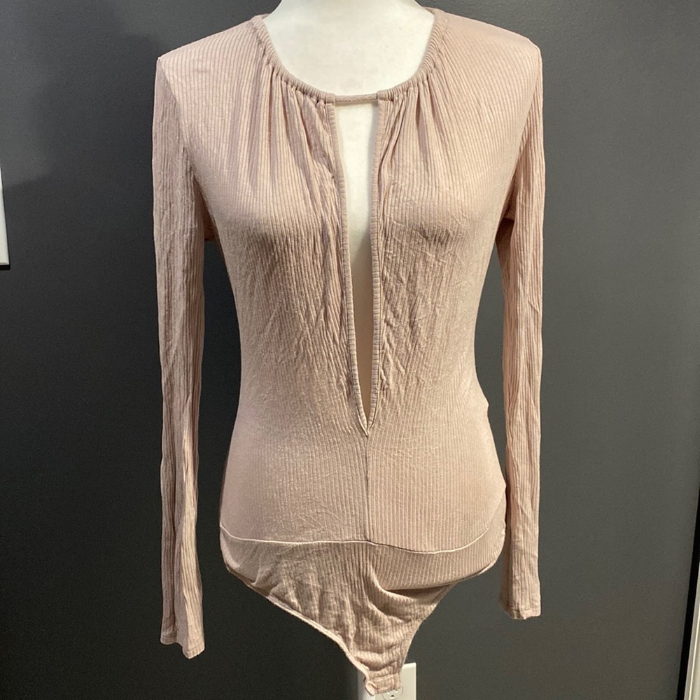 Low cut long sleeve body suit size XL